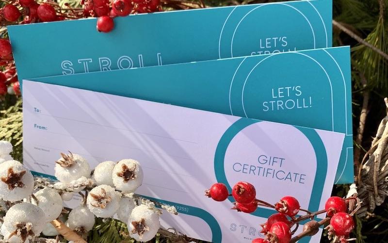 Stroll Gift Certificates tucked in a Christmas wreath