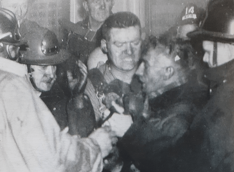Firefighter rescue at 'The Chicken Next' fire, Ontario Street