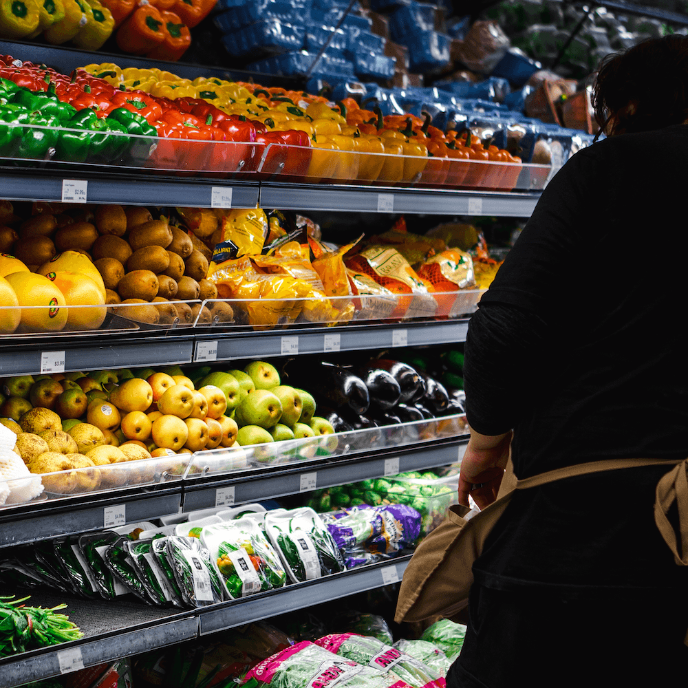 Grocery Store shelves with produce at Marche Leo's